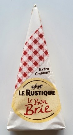 A triangular wedge of Brie cheese